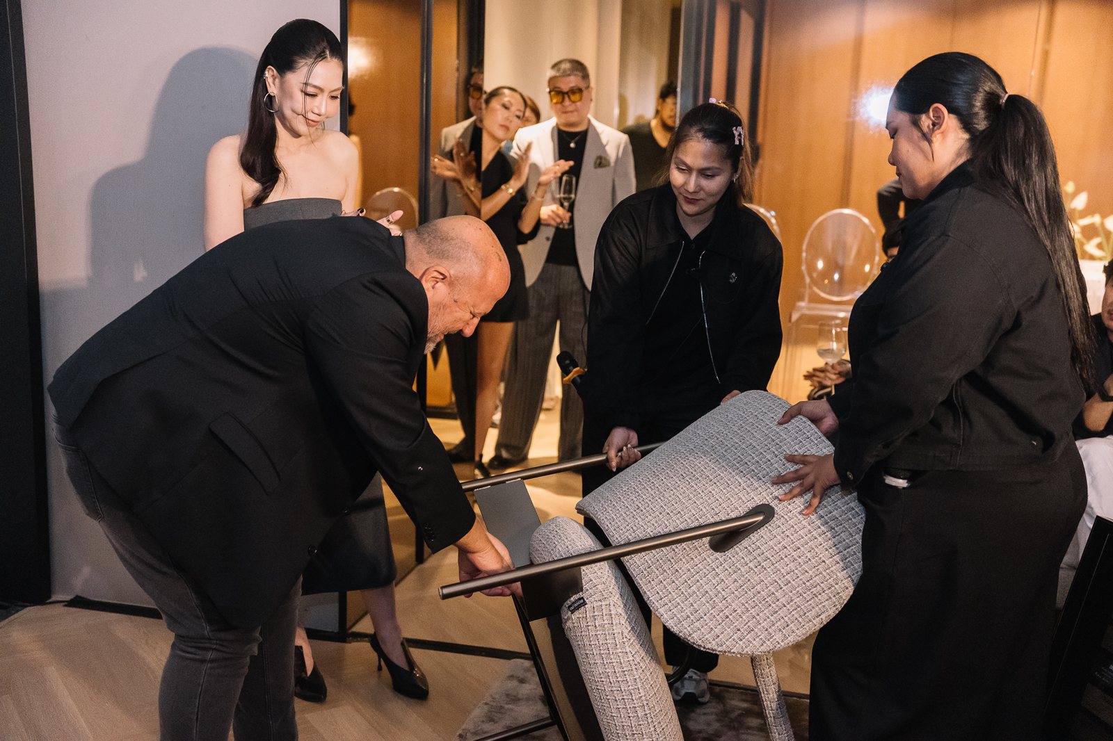 Alberto Bonaldo fitting the plaque on Chair No. I by hand, Bonaldo Space by OL Atelier, Bangkok